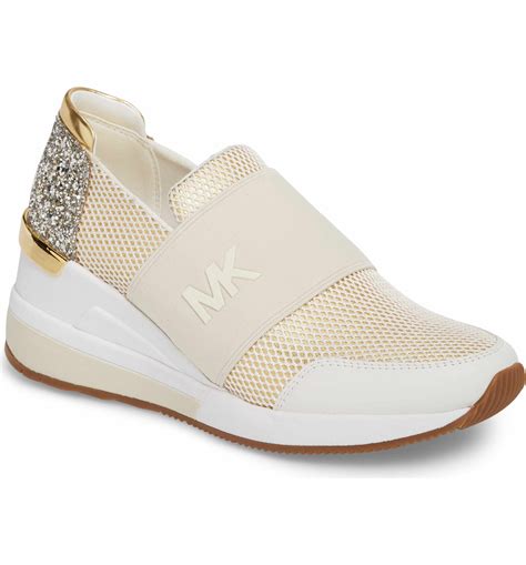 michael kors rose gold slip on girls sneakers|michael kors black glitter sneakers.